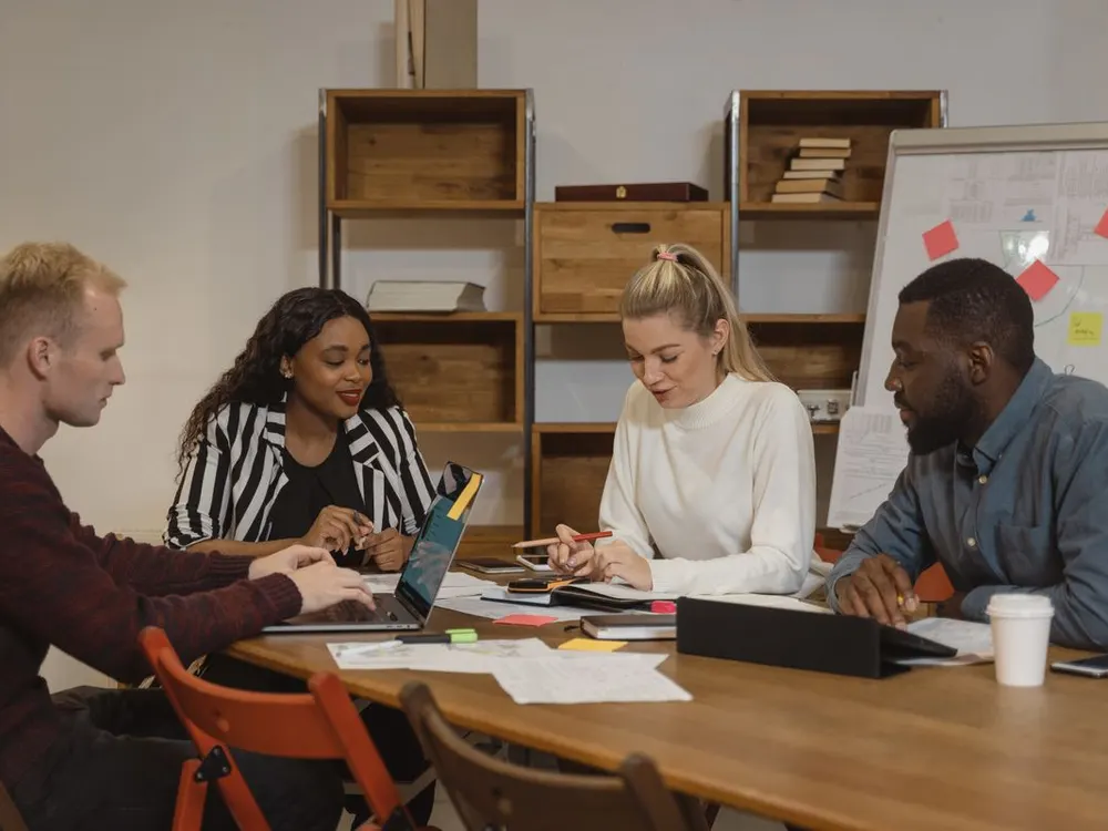 The team reviewing a client project together