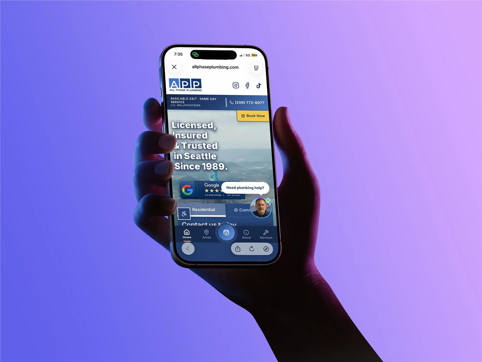 All Phase Plumbing's new site shown on a phone, held up against a purple gradient background